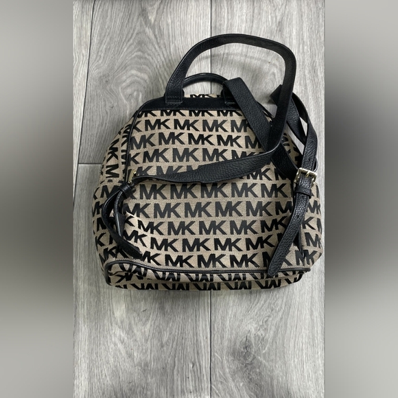 abbey large logo jacquard and leather backpack Michael Michael Kors Jaycee Medium and plenty of room inside to store your laptop and other necessities. Rhea Medium Logo Jacquard Denim